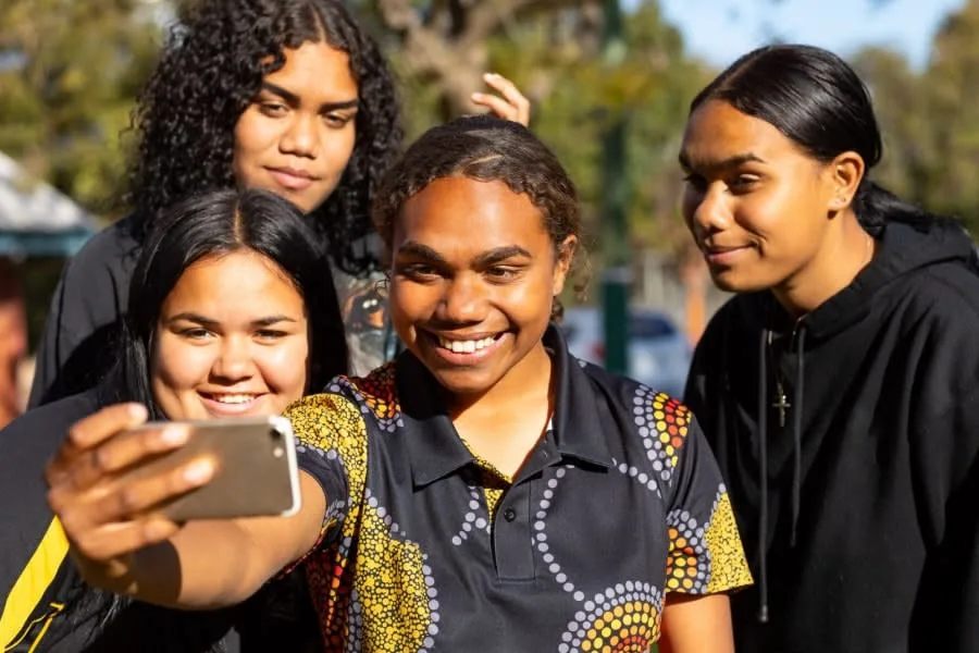 Young people taking a selfie together